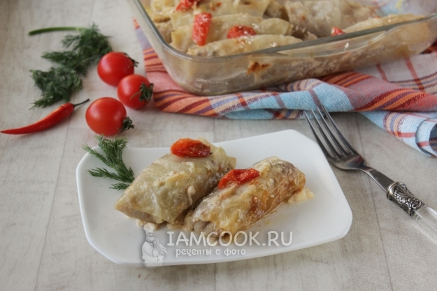 Foto van koolbroodjes onder een bontjas in de oven