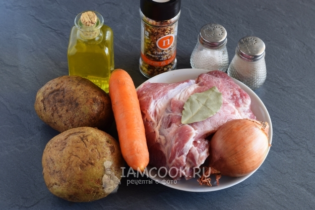 Bahan-bahan untuk kentang rebus dengan daging dalam periuk tekanan