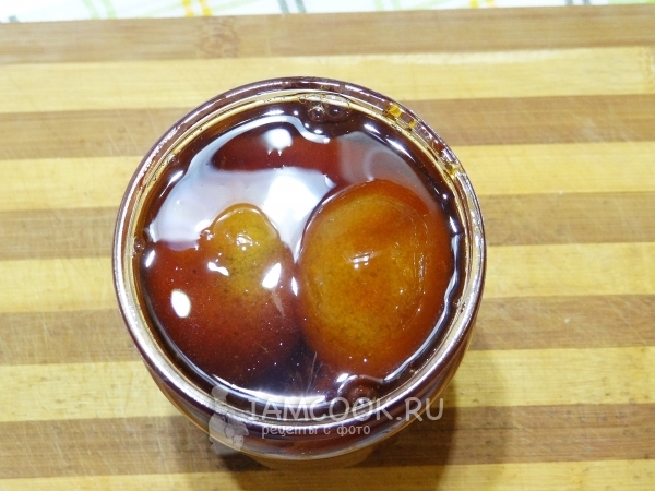 Umieść puszki mandarynek w syropie